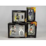 Minichamps - Four boxed 1:12 scale resin Limited Edition figures of Valentino Rossi by Minichamps.