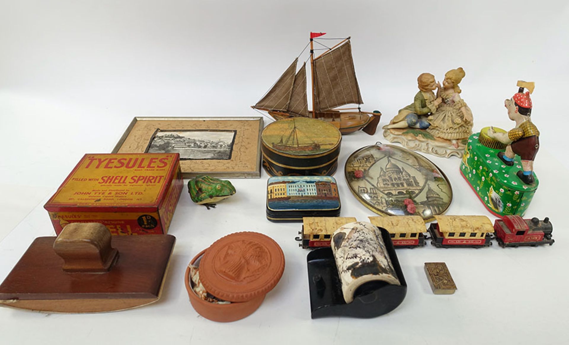 COLLECTION OF 14 SMALL ITEMS ('snuisterijen') from Biesheuvel's study: tin toys (1 money box and a