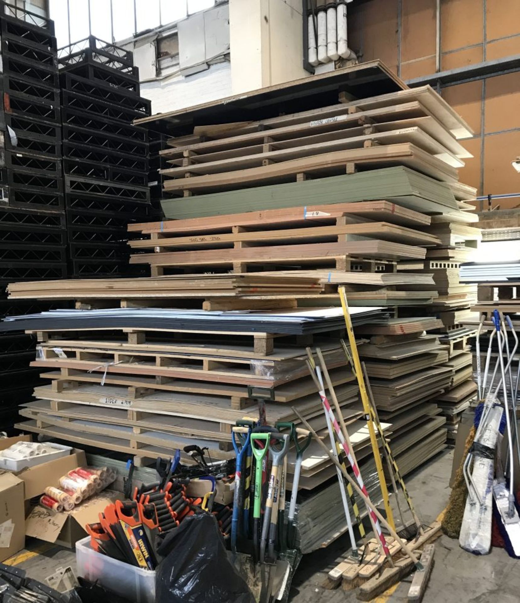 A quantity of sheet and planed softwood materials