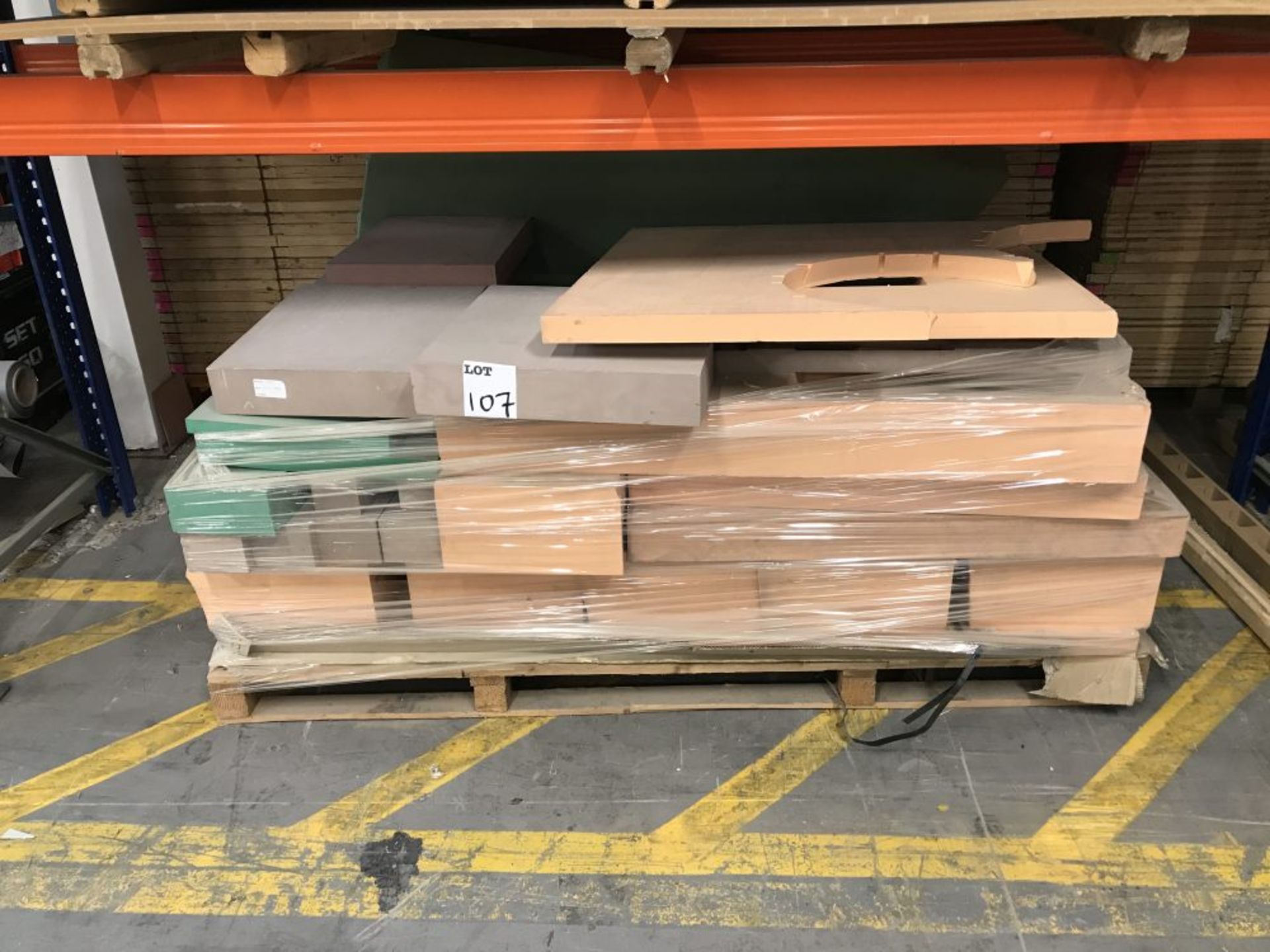 A pallet of various sized model boards