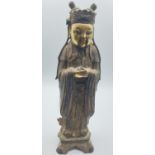 An 18th century Chinese bronze statue with gilded face and hands, 17.5cm tall