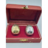 Egg shaped 800 silver cruet set in original box one of them in gilt finish, 68g weight and 4cm high