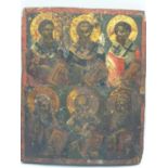 A Greek Orthodox classic icon with a hand painted depiction of 6 saints on curved wood