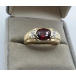 9ct yellow gold diamond and garnet ring, weight 5g. Size U