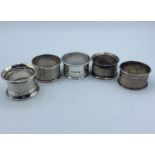 Selection of 6 assorted silver napkin rings, total weight 225g