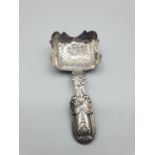 Antique George III silver caddy spoon. Rectangular shaped bowl wilt an engraved chequered design and