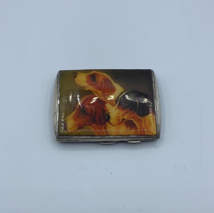 Art deco style silver cigarette box with picture of 3 dogs on lid