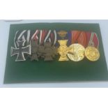 A bar of 6 German military medals to include a 1914 Imperial iron cross, medal cross of iron 1914-