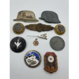 Assortment of 10 German badges + cockades