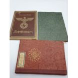 3 WWII German books, a sport award book with gold leaf, an Arbeitsbuch (work book) and a stamp