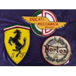 3x cast iron dealer signs to include Ducati, Norton (W20.5cm) and Ferrari (L29cm)