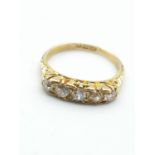 18ct yellow gold with 5 diamonds (approx 0.25ct), weight 2.5g. Size J 1/2