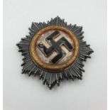 WW2 German cross in gold damaged enamel (replica)