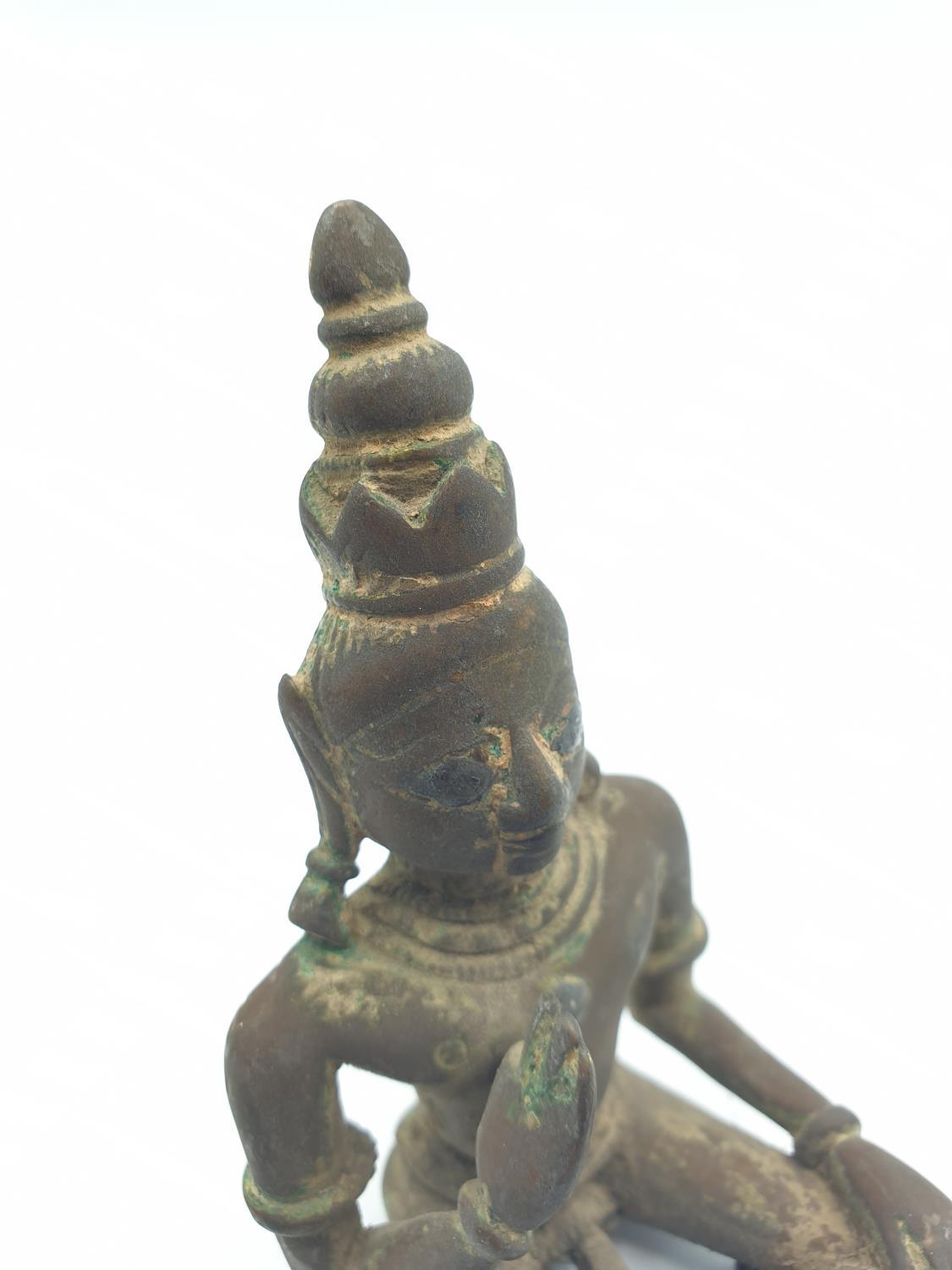 Late 18th century Oriental religious figure in bronze with gilt finish mostly worn off with age, 9cm - Image 5 of 9