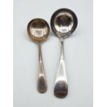 2 silver plated sauce ladles. One marked Walker & Hall and the other marked Harrods.