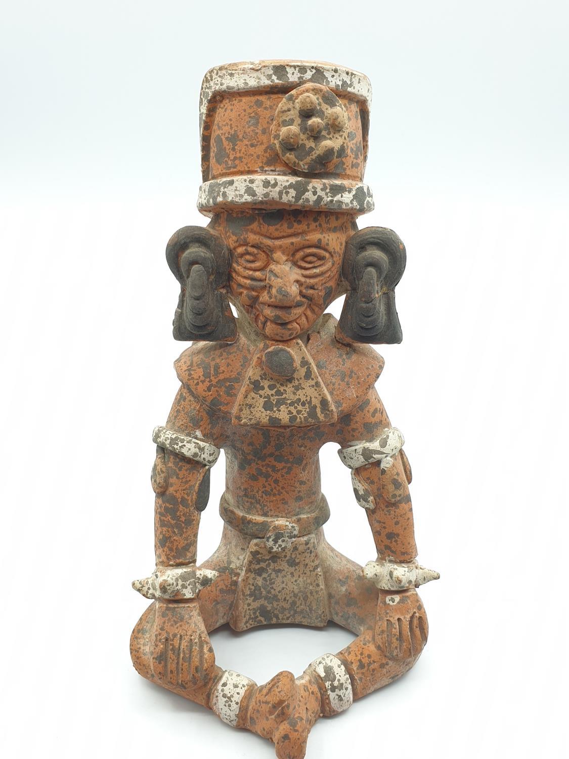 A very early terracotta figurine of Aztec God, 19cm tall