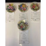 8 flower plates. 4 from Dorothy Wallace each with a certificate of authenticity.