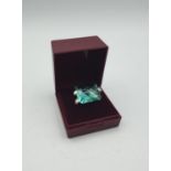 Stone set silver ring with large square cushion cut turquoise stone. marked 925 Size Q