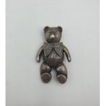 Vintage Solid silver teddy bear brooch with silver marquisette bow tie. 5cm x 3cm approx 19.5