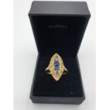Antique boat shaped 18ct yellow gold ring consisting 5 graduated sapphires forming a centre line