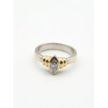 Stone set diamond and 18ct gold ring, having a third of a carat single stone in a boat shaped