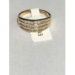 9K GOLD RING WITH BAGUETTE DIAMONDS (0.65CT TOTAL) WEIGHT 2.7G AND SIZE K ECN 457