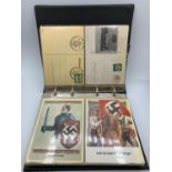 A file of 61 German postcards from the 1930s including many of Hitler and with Hil stamp on.