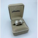 14ct white gold with diamonds (approx 0.60ct), weight 9.1g and size W