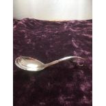 George Jensen silver caddy spoon, clearly marked Sterling Denmark G.J.Ltd 1937, handle has arts