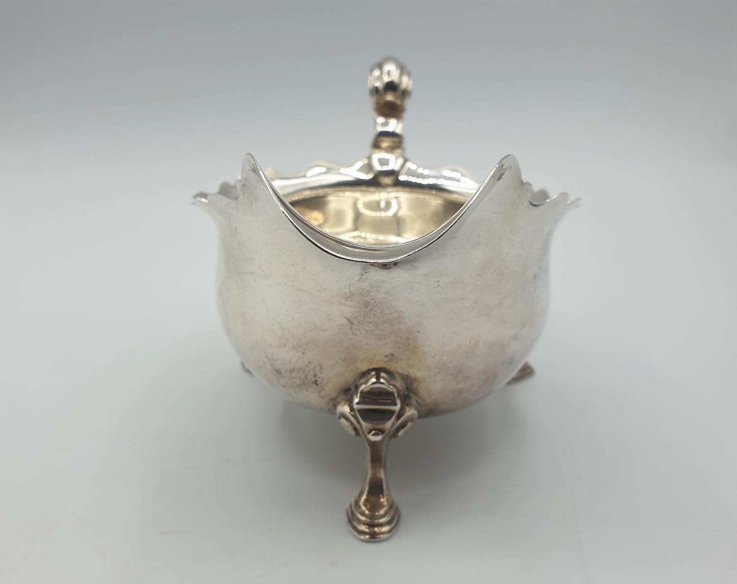 Antique Silver Sauce/ Gravy boat with three cabriole legs and having an unusual scale design to - Image 2 of 5