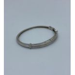 18ct white gold bangle with diamonds (approx 1.35ct), weight 14.9g and 6cm inner width