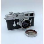 Leica M3 Rangefinder Film Camera in excellent condition and with a leather case.