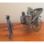 Chinese silver Rickshaw Cruet set, inscription for Hong Kong 1908, 21cm long and 12cm tall approx