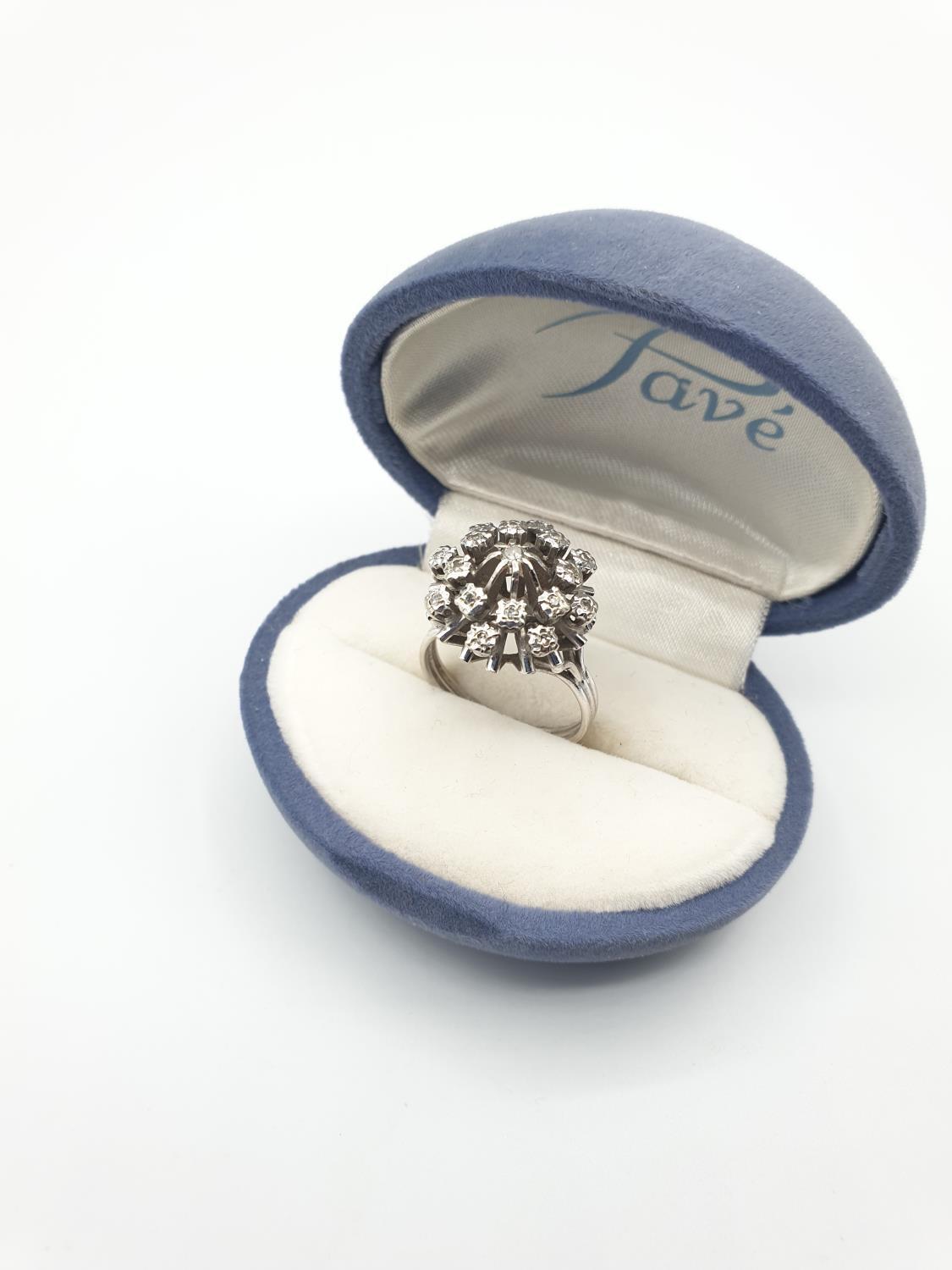 18CT WHITE GOLD DIAMOND CLUSTER RING, SIZE M WEIGHT 6.2G. Hallmark inside the band showing 750 for