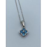 9ct white gold pendant with small diamond and topaz, weight 181g and 42cm long