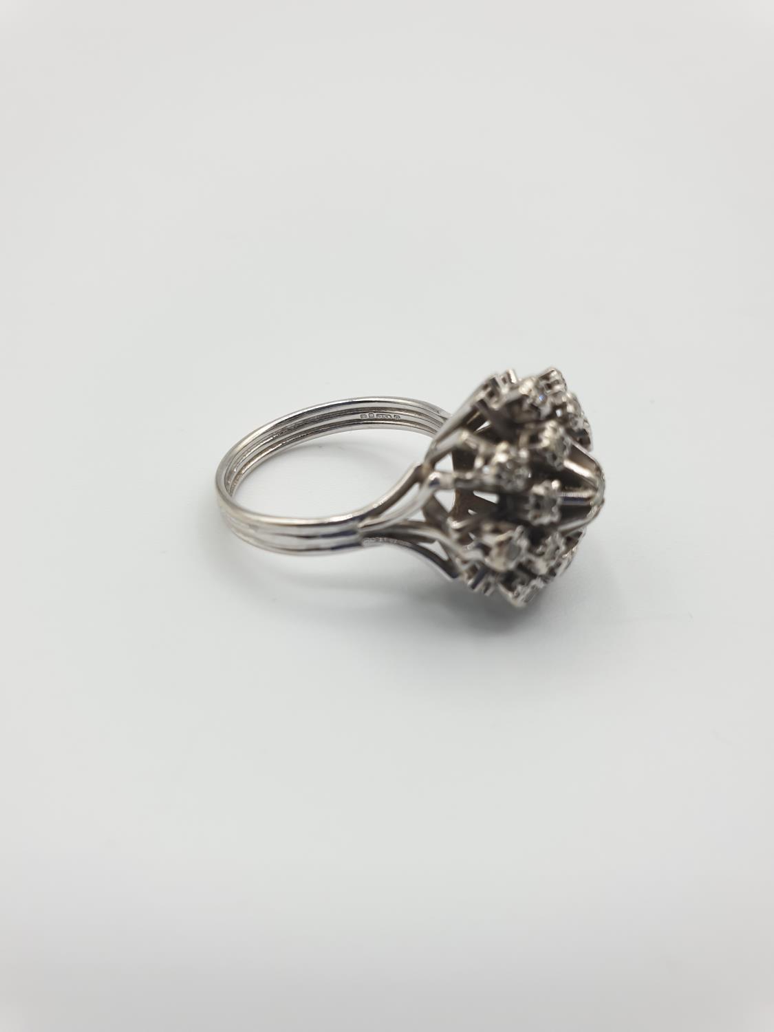 18CT WHITE GOLD DIAMOND CLUSTER RING, SIZE M WEIGHT 6.2G. Hallmark inside the band showing 750 for - Image 5 of 6