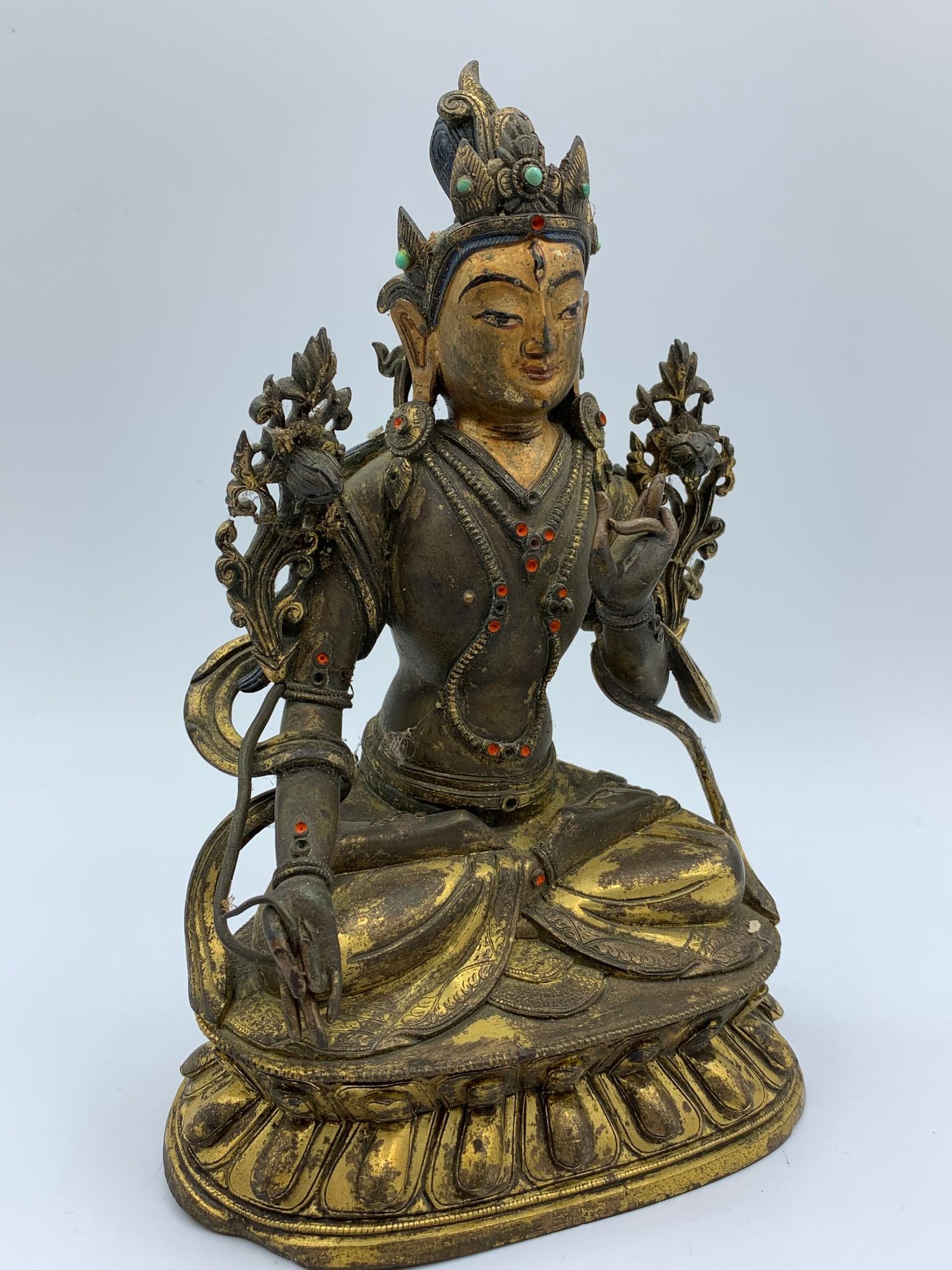 A very early Tibetan religious deity gilt on bronze with turquoise stones and painted dace, weight - Image 11 of 14