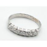 9ct white gold ring with 7 small diamonds (0.35ct in total), H colour, size Q and weight 2.2g