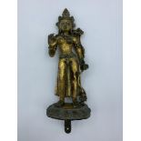A very early gilt on bronze religious figure without base, weight 820g