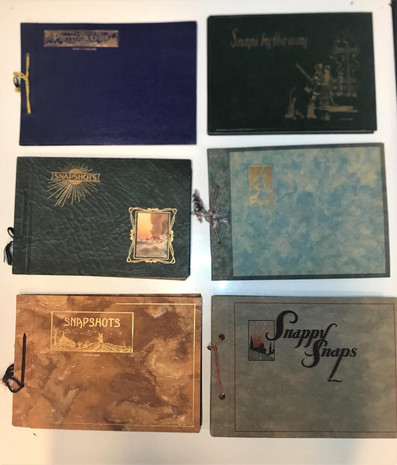 An assortment of 8 Greta Garbo scrapbooks