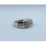 9ct white gold with 0.25ct diamond centre and encrusted diamonds surround, weight 5.3g and size U