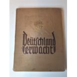 A 1930's edition of Deutchland ermacht complete with all photos, poor condition