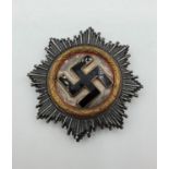 WW2 German cross in gold damaged enamel (replica)
