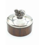 Silver topped pill box by Brian Leslie Fuller, having a silver cat sitting atop the lid with the