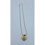 18ct yellow gold and diamond pendant on 18ct gold chain, weight 5.92g and 44cm long