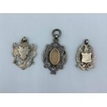 Selection of 3 silver pendants with full hallmark of silver from Birmingham. The total weight is