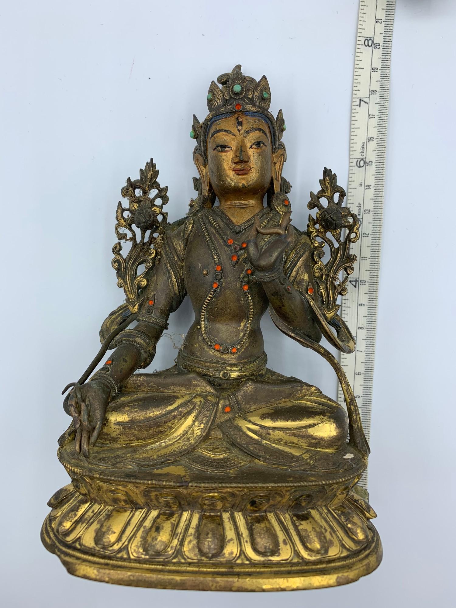 A very early Tibetan religious deity gilt on bronze with turquoise stones and painted dace, weight - Image 12 of 14