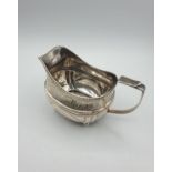 Antique Silver creamer Jug with hallmark showing N. Hart. London 1811 Requires Attention to back