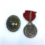 Black wound badge + east front medal and ribbon.