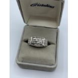 14ct white gold with diamonds (approx 0.42ct), weight 7.6g and size T